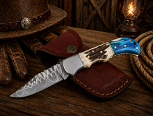Load image into Gallery viewer, Hand Forged Damascus Pocket Knife – Engraved Folding Knife with Stag Horn &amp; Blue Pakka Wood Handle