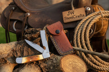 Load image into Gallery viewer, Razor Trapper Knife with Burned Bone Handle and Steel Bolsters