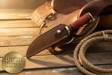 Load image into Gallery viewer, Field-Ready Damascus Gut Hook Knife with Rich Burgundy Wood Grip