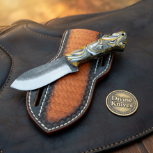 Load image into Gallery viewer, Orange Swirl Resin Rasp Skinner Knife with Tooled Leather Sheath