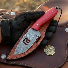 Load image into Gallery viewer, Cowboy Silhouette Skinner Knife with Red Pakkawood Handle for Hunters and Outdoor Users