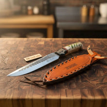 Load image into Gallery viewer, 10-Inch Hammered Spear Point Survival Knife — Ram Horn Black Resin Handle, Tiger Engraved Copper Bolster &amp; Leather Sheath
