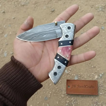 Load image into Gallery viewer, Handmade Damascus Folding Knife with Engraved Bolster, Black Resin and Colored Bone Handle – Custom EDC Pocket Knife by JW SteelCrafts