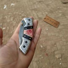 Load image into Gallery viewer, Handmade Damascus Folding Knife with Engraved Bolster, Black Resin and Colored Bone Handle – Custom EDC Pocket Knife by JW SteelCrafts