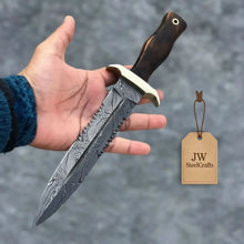 Load image into Gallery viewer, Hammer forged Damascus Dagger Knife with 8” Double Edge Serrated Blade, Sawback Spine, Brass Guard, Rosewood Handle (Full Tang Fixed Blade)