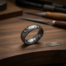 Load image into Gallery viewer, Domed Woodgrain Damascus Ring with Knot Pattern Steel
