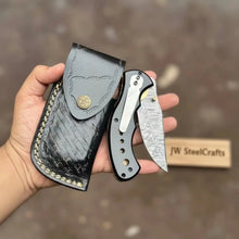 Load image into Gallery viewer, Damascus Steel Folding Pocket Knife — Recurve Clip Point Blade, Black Resin Handle, Pocket Clip &amp; Cowhide Leather Sheath
