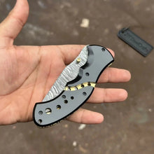 Load image into Gallery viewer, Damascus Steel Folding Pocket Knife — Recurve Clip Point Blade, Black Resin Handle, Pocket Clip &amp; Cowhide Leather Sheath
