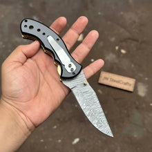 Load image into Gallery viewer, Damascus Steel Folding Pocket Knife — Recurve Clip Point Blade, Black Resin Handle, Pocket Clip &amp; Cowhide Leather Sheath