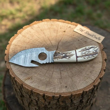 Load image into Gallery viewer, Handmade Damascus Gut Hook Skinner Hunting Knife Fixed Blade Synthetic Stag Handle with Thumb Hole