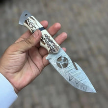 Load image into Gallery viewer, Damascus Gut Hook Hunting Knife with Deer Cutout Blade and Synthetic Stag Handle