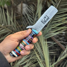 Load image into Gallery viewer, Damascus Bull Cutter Knife — Multi-Color Rainbow Resin Handle, Christian Cross Blade Engraving, Steel Bolster &amp; Lanyard Hole