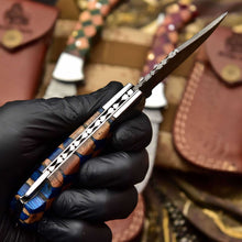Load image into Gallery viewer, Handmade Damascus Folding Knife – Checker Pattern Wood Handle (Red, Green, Blue) with Leather Sheath