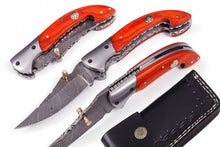 Load image into Gallery viewer, Handmade Damascus Folding Knife with Orange Pakka Wood Handle &amp; Leather Sheath