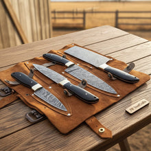 Load image into Gallery viewer, Handmade Damascus Kitchen Knife Set with Cleaver, Chef Knife, Utility and Paring Knife, Black Micarta Handles with Brass Bolsters, Leather Roll Included, JW SteelCrafts