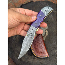 Load image into Gallery viewer, Handmade Feather Pattern Damascus Folding Knife with Purple Resin Handle &amp; Leather Sheath