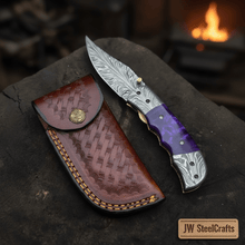 Load image into Gallery viewer, Handmade Feather Pattern Damascus Folding Knife with Purple Resin Handle &amp; Leather Sheath