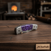 Load image into Gallery viewer, Handmade Feather Pattern Damascus Folding Knife with Purple Resin Handle &amp; Leather Sheath