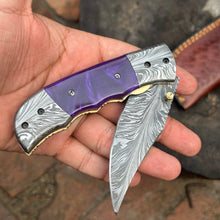 Load image into Gallery viewer, Handmade Feather Pattern Damascus Folding Knife with Purple Resin Handle &amp; Leather Sheath