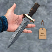 Load image into Gallery viewer, Hammer forged Damascus Dagger Knife with 8” Double Edge Serrated Blade, Sawback Spine, Brass Guard, Rosewood Handle (Full Tang Fixed Blade)