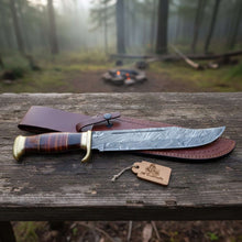 Load image into Gallery viewer, Sheffield Clip Point Bowie Knife Handmade Damascus Steel Blade Brass Guard Leather Sheath JW SteelCrafts