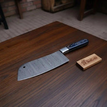 Load image into Gallery viewer, 7-Inch Forged Damascus Cleaver Knife — Twisted Pattern Blade, Grey Pakka Wood Handle, Steel Bolster &amp; Hanging Hole | JW Steel Crafts