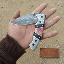 Load image into Gallery viewer, Handmade Damascus Folding Knife with Engraved Bolster, Black Resin and Colored Bone Handle – Custom EDC Pocket Knife by JW SteelCrafts
